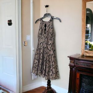 Sleeveless key hole halter neck glitter lace dress from R & M collection size 14